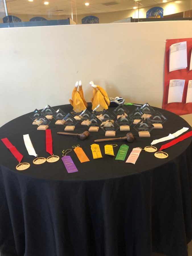 The awards table for the EVHS Speech & Debate Meet. 