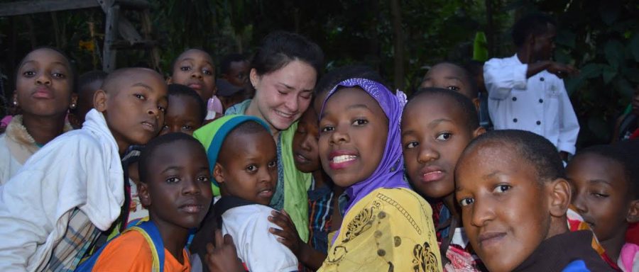 Children+say+goodbye+to+Kaikea+Cavaliero+19%2C+an+American+volunteer%2C+who+taught+at+their+school+in+Arusha%2C+Tanzania+for+two+weeks.+Kaikea+volunteered+in+Tanzania+with+an+organization+called+Children%E2%80%99s+Global+Alliance+and+brought+these+children+basic+supplies+to+live+and+helped+them+get+the+education+they+deserve.+