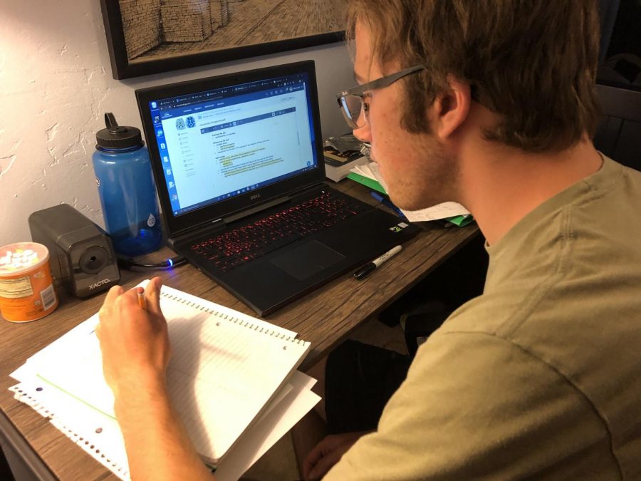 Carter Josef 21 completes some online assignments for his e-learning classes. 