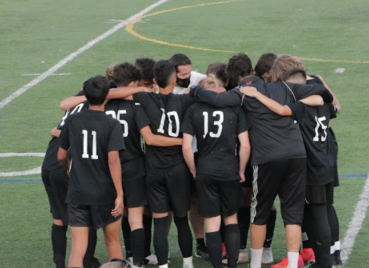 Wheeler gives an inspiring pep talk to the team during halftime.